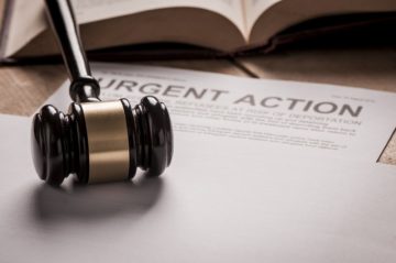 legal action document with gavel