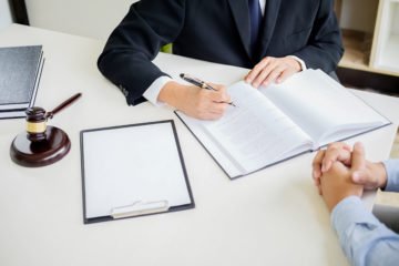 Our Roanoke class action lawyer working on papers