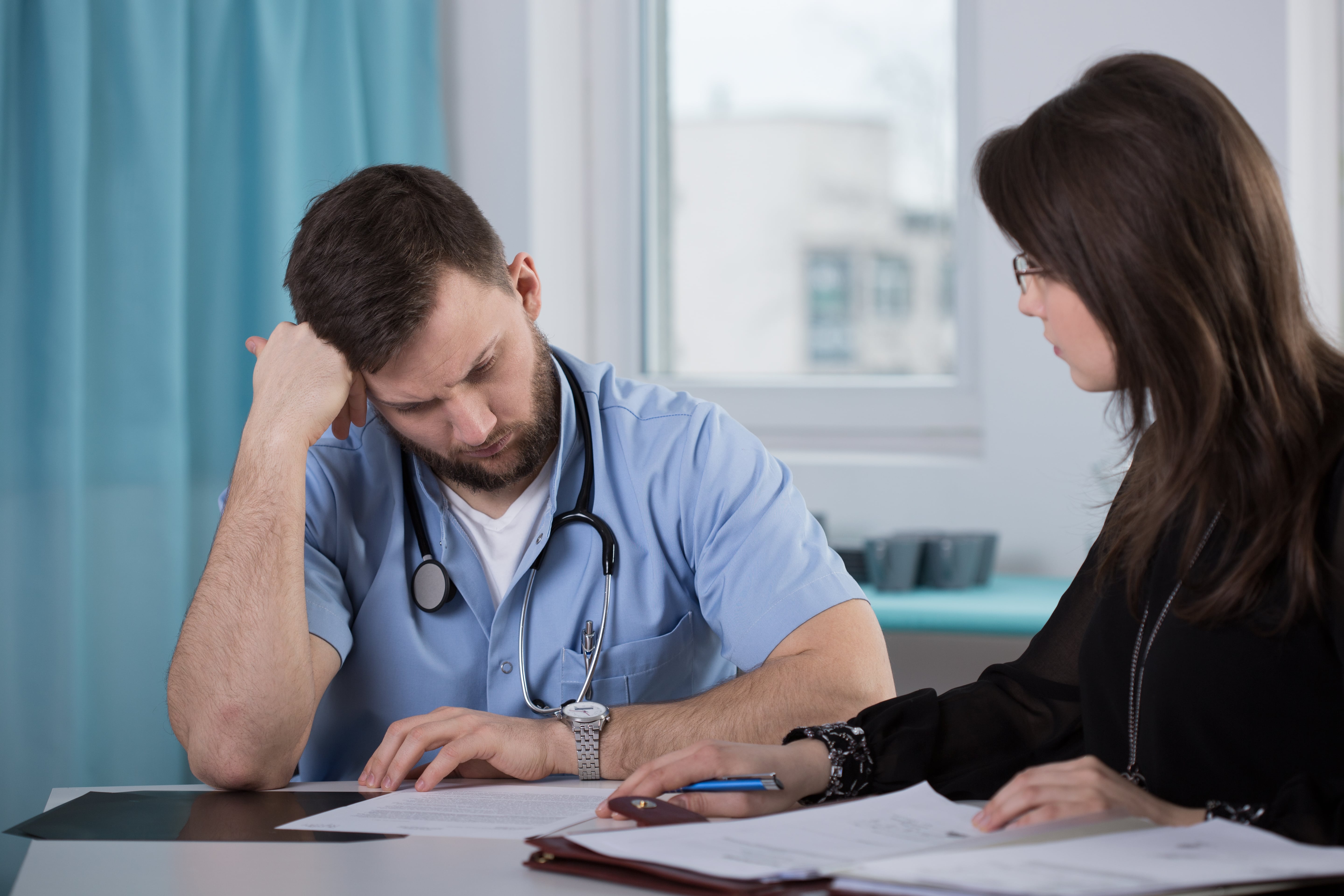 How can I find out if a doctor has ever been disciplined by the Virginia Board of Medicine or whether the doctor has paid a medical malpractice settlement?