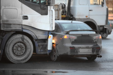 Truck vs car accident in the highway.