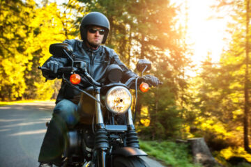 Motorcycle rider strolling on a sunset